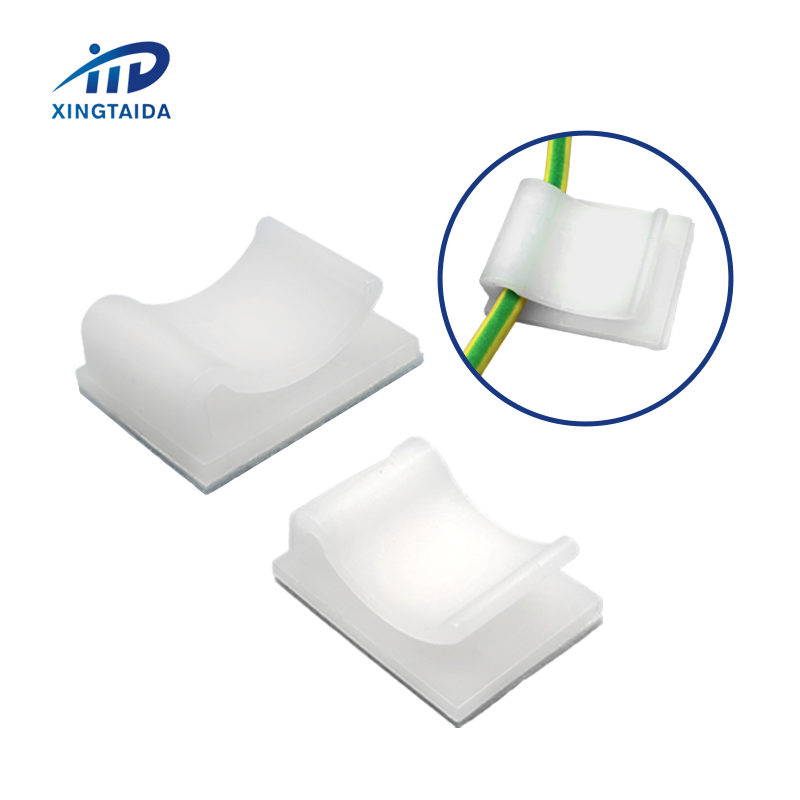 White adhesive cable clips